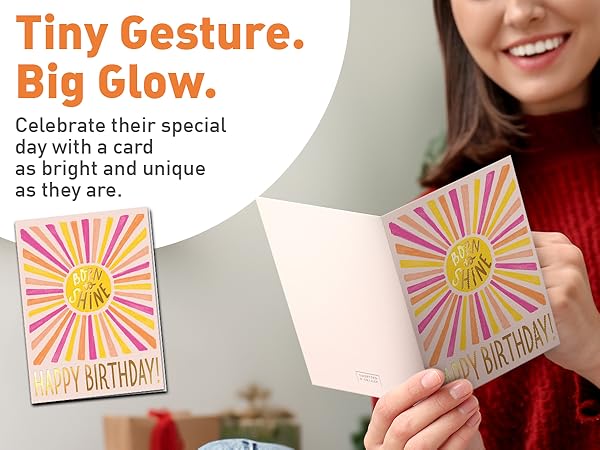 birthday card being read with envelope and gold sticker shown