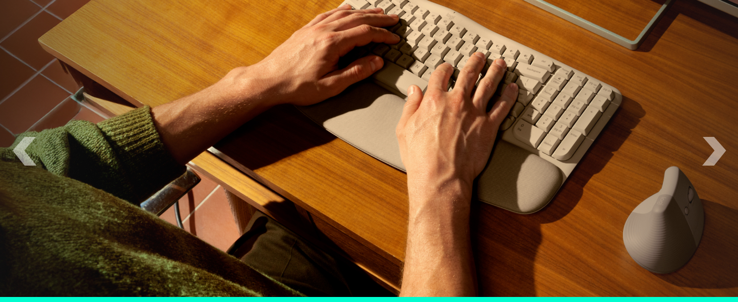 a person using a keyboard and a mouse