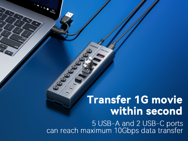 Text reads 'Transfer 1G movie within second' and '5 USB-A and 2 USB-C ports can reach maximum 10Gbps data transfer'. Silver multi-port USB hub connected to laptop via USB cable on blue background.