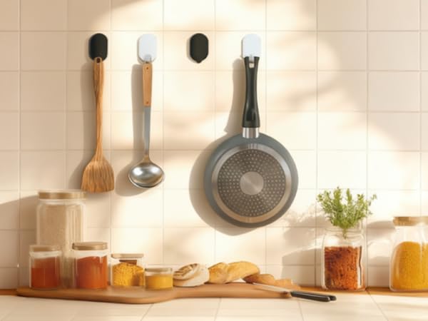 Kitchen Storage: Durable adhesive hooks for utensils, pans, dish towels, and aprons.