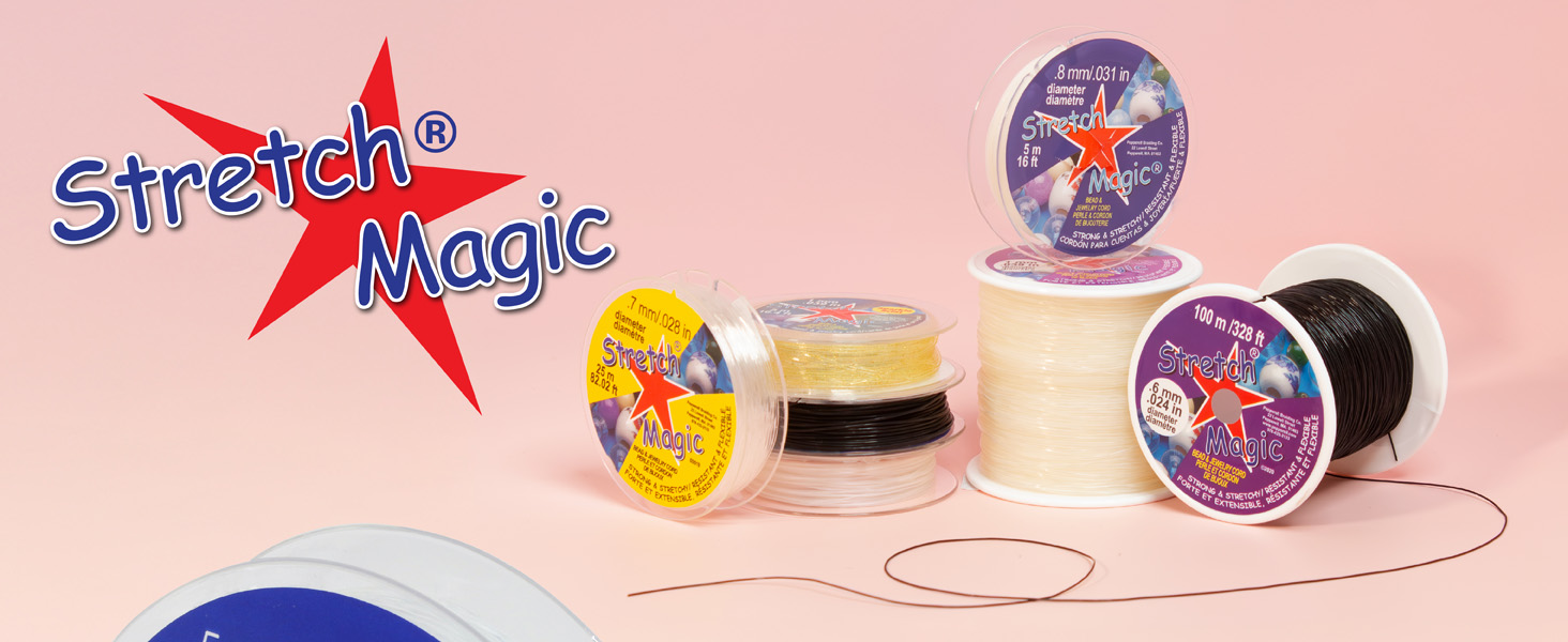 Stretch Magic elastic cord in different colors and varieties with loose string on pink background.