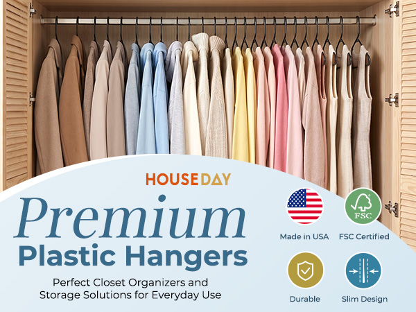 Winter coats and chunky sweaters on sturdy white hangers. 50 pack for seasonal rotation