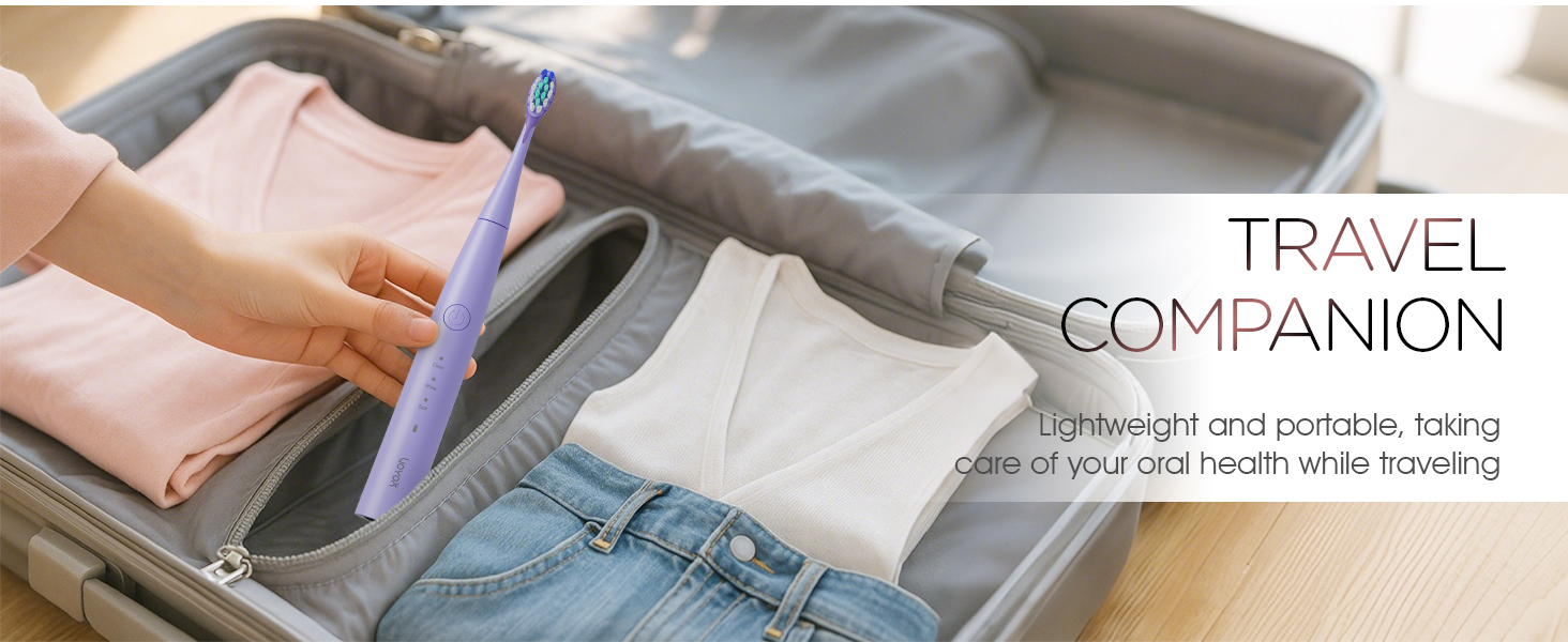 Text reads 'TRAVEL COMPANION'. Close-up view of folded clothing or textiles in gray tones with purple accent visible.