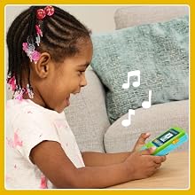 Kid rocks out to one of the 3 Preschool Game & Go learning songs.