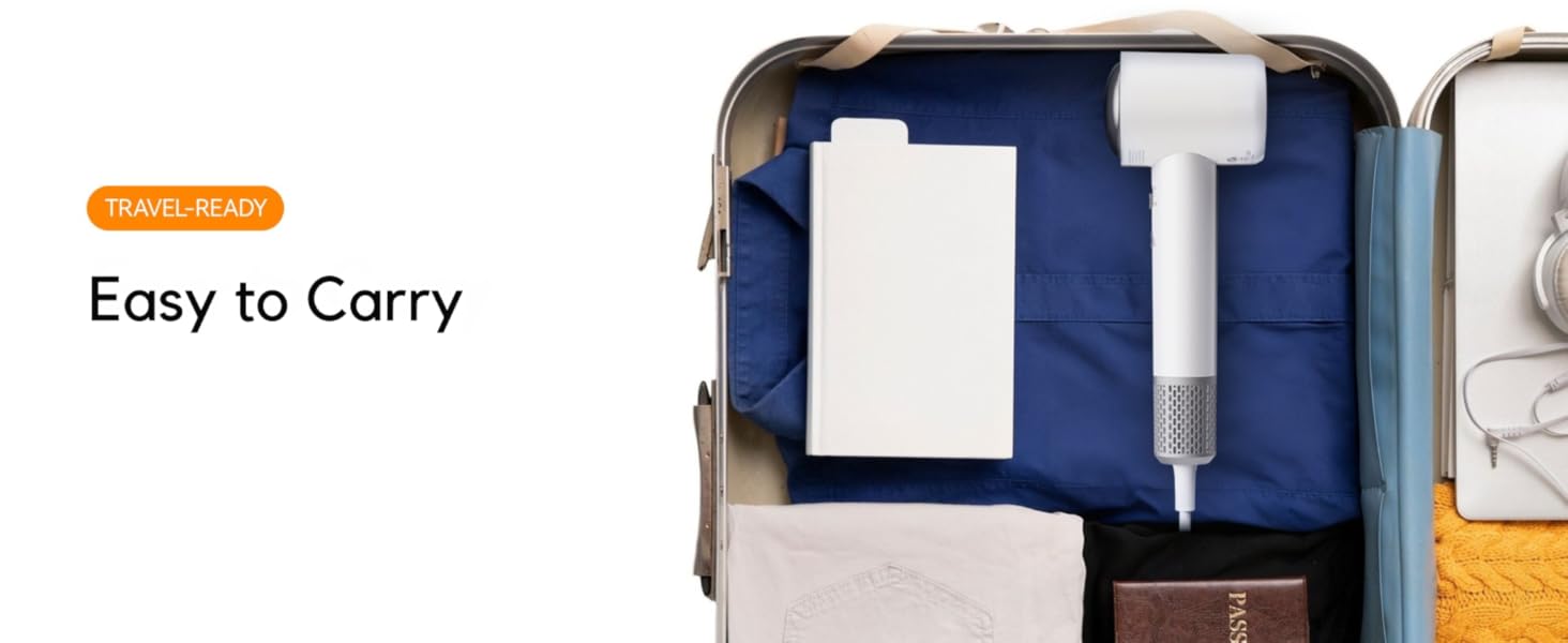 Overhead flat-lay of an open suitcase on a bed