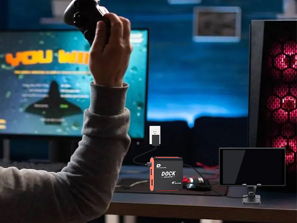 With the Switch Dock Capture Card on the desk operating in capture mode to record or stream gameplay