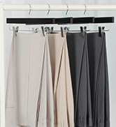 black wooden pant hangers