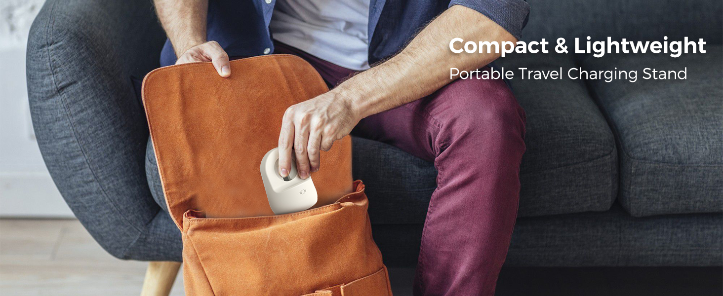Person inserting a white electronic device into a brown bag. Text overlay reads 'Compact & Lightweight Portable Travel Charging Stand', indicating the product's function and portability.