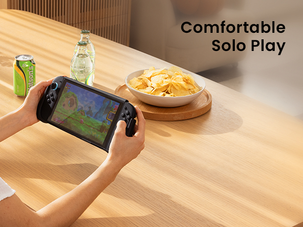 Text reads 'Comfortable Solo Play'. Series of images showing hands interacting with electronic device or gaming controller on wooden surface.