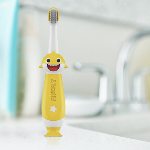 First Firefly training toothbrush on sink