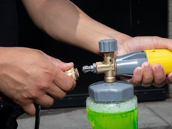 Car wash foam cannon spraying thick soap for trucks, SUVs, and motorcycles