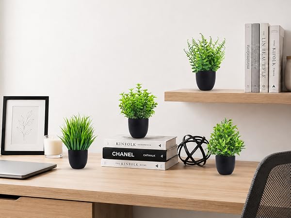 four artificial green plants black pots office shelf decor