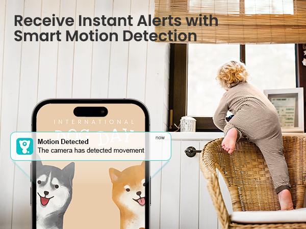 Smartphone displaying motion detection alert with dog icons. Elderly person in background near window.