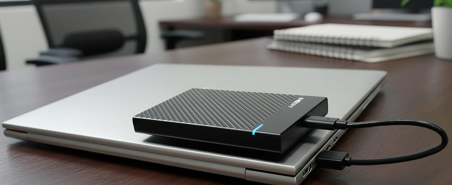 Magnetic external hard drive enclosure attached to laptop, USB-C portable SSD HDD case,
