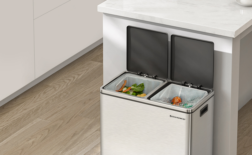 a refrigerator with three drawers in it.