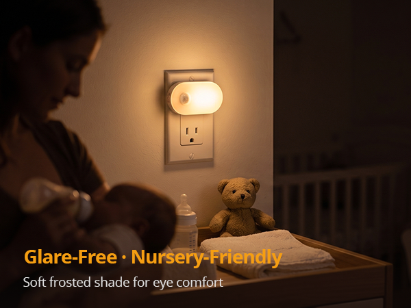 Eye-caring nursery plug-in night light with frosted cover.