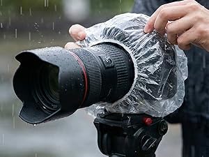 Photographer use as camera wrap on rainy day