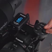 Micro-Mixer mounted on a Camera with Shotgun and Wireless System plugged in to mixer