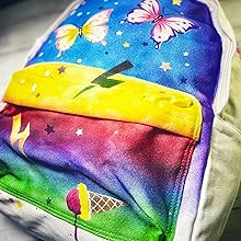 a rainbow blanket with a rainbow butterfly design