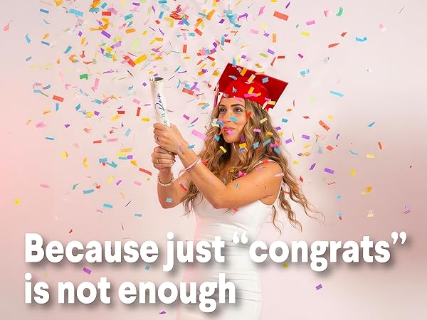 Smiling woman in graduation cap holding confetti cannon with colorful burst showcasing big wins