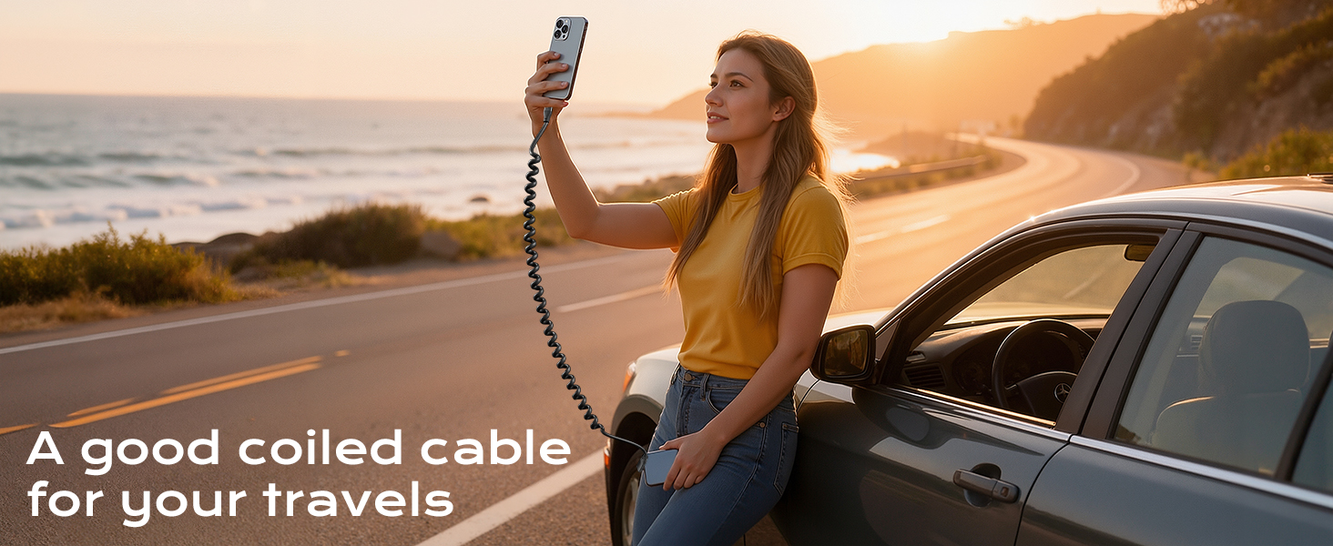 Text reads 'A good coiled cable for your travels'. Coiled charging cable shown in use with mobile device in outdoor setting.