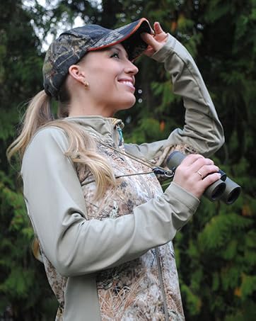 women holding a binocular and using Rick Young Outdoor's bino harness