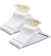 white wooden hangers with gold hooks