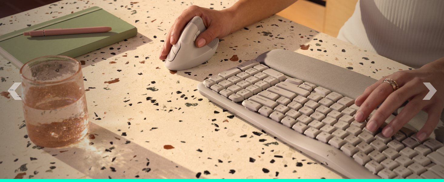 a person using a keyboard and a mouse