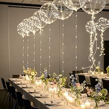 LED balloons on a dinner table