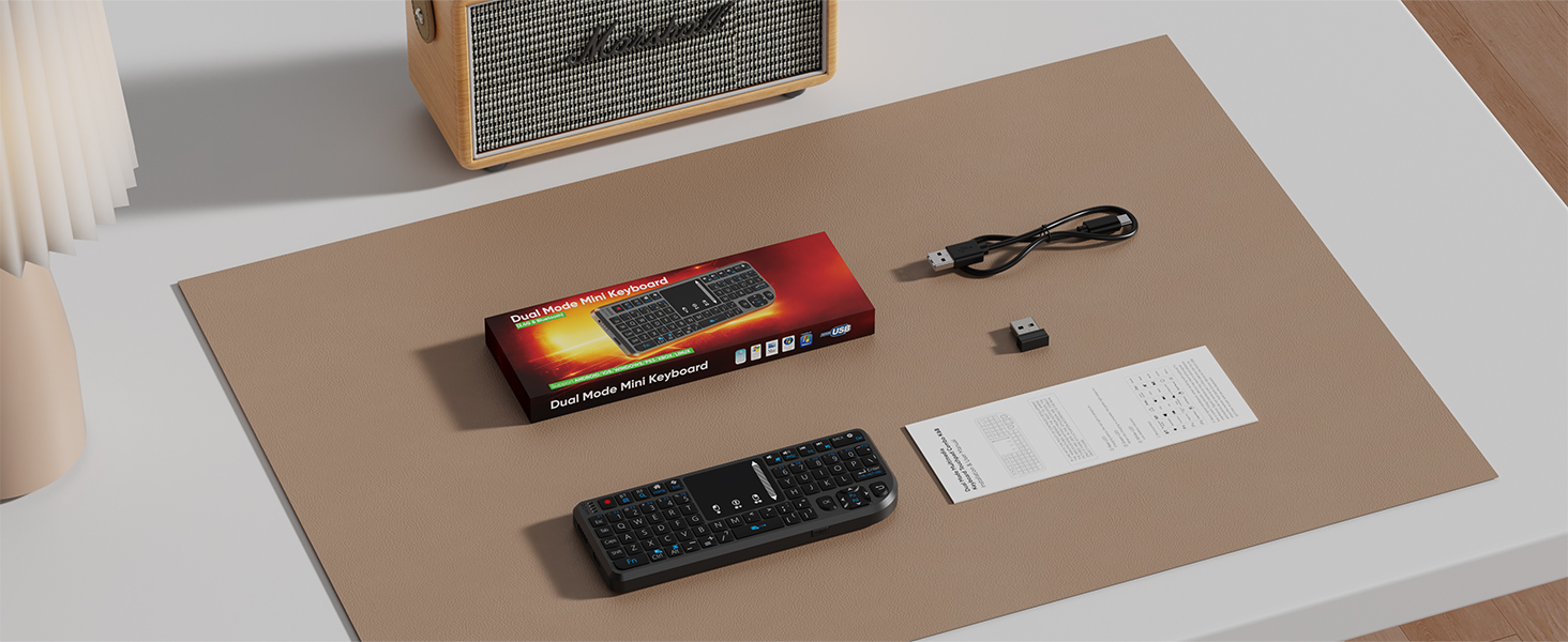 Package Contents: Mini keyboard, instruction manual, charging cable, receiver