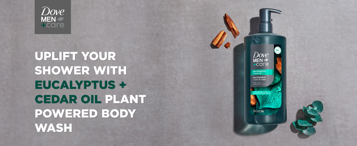 Dove Body Wash pump bottle on dark grey background with pieces of eucalyptus and cedar wood.