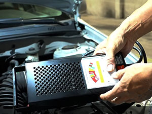 The Schumacher Electric car battery tester features a retro design.
