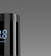 Close-up of a black cylindrical device with a blue digital display showing '4.0' and 'kg/cm²' units, suggesting a pressure or density measurement tool.