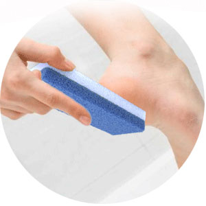 Remove callus with foot sponge file