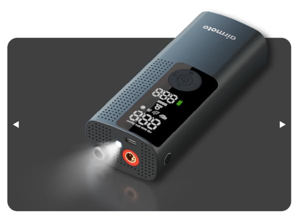 car tire air pump connected to sedan tire, showing compact, cordless design