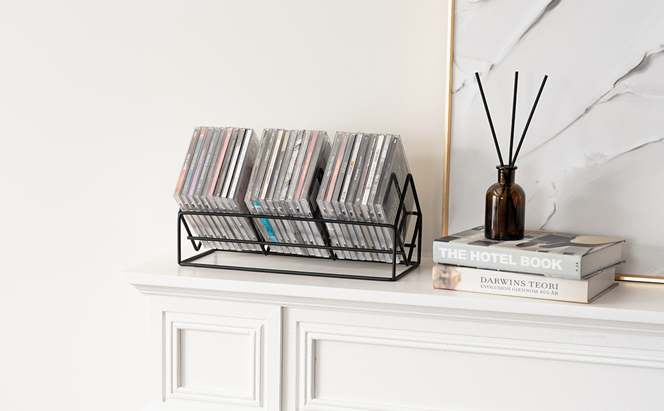 matte black metal wire CD case holder organizer rack on mantel