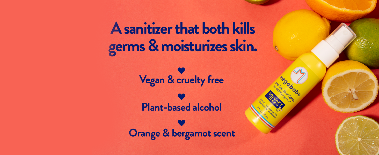 Hand sanitizer 2 oz spray on red background next to lemons and limes.
