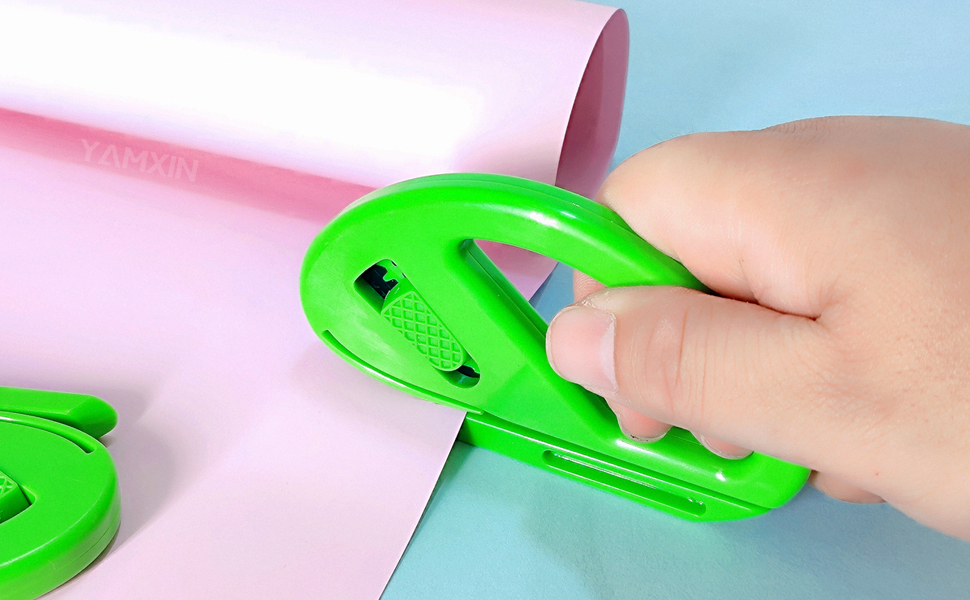 Easy slide gift wrapping papaer cutter tool