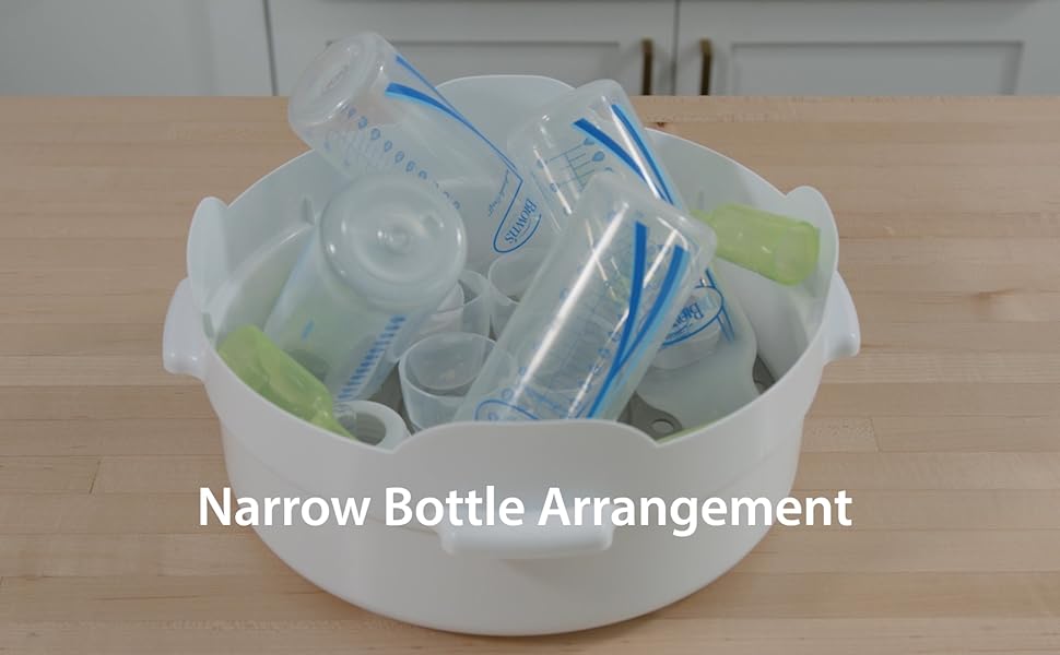 narrow baby bottles in microwave sterilizer on counter top