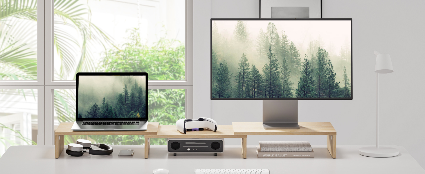 Modern living room interior with wall-mounted TV and forest artwork. White walls, natural lighting, and minimalist furniture arrangement.