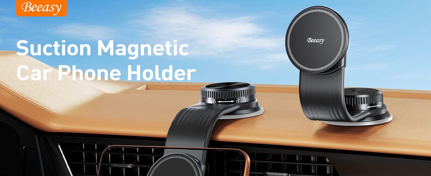 Text reads 'Gravity Suction Magnetic Car Phone Holder.' Black magnetic phone holder mounted on dashboard and steering column, with circular phone cradle and adjustable arms.