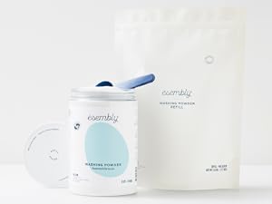 Washing Powder Canister in front of a Washing Powder Refill Bag