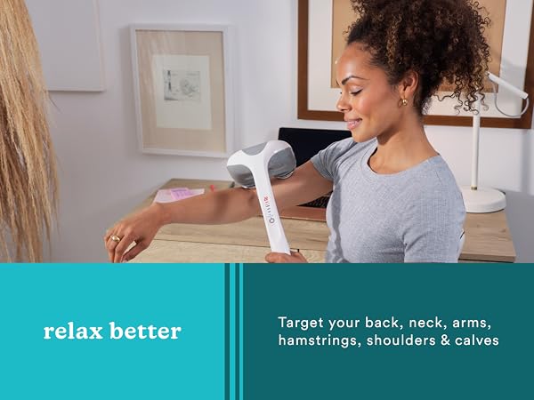 woman with handheld massager