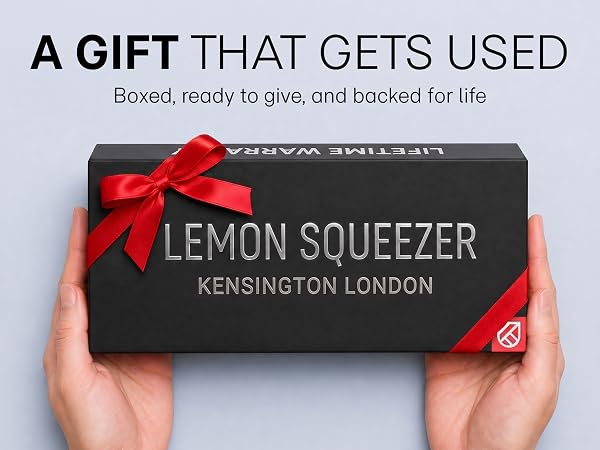 Two hands present a black gift box holding a lemon squeezer with a lifetime warranty.