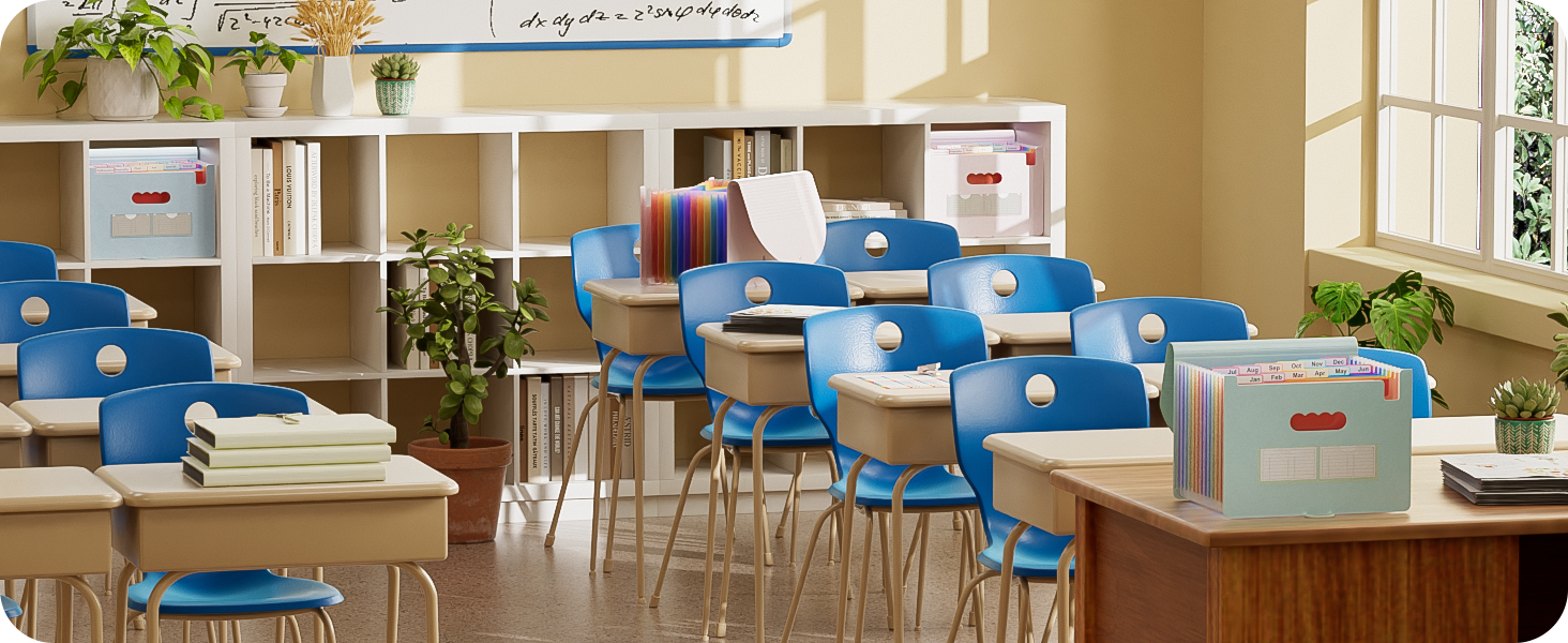 Modern classroom interior with blue chairs, white tables, and built-in shelving units along wall. Natural lighting from windows.
