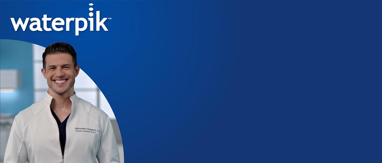 Dr. Strandburg smiling, blue background, waterpik logo