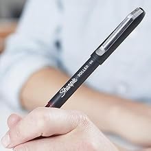 Hand gripping pen