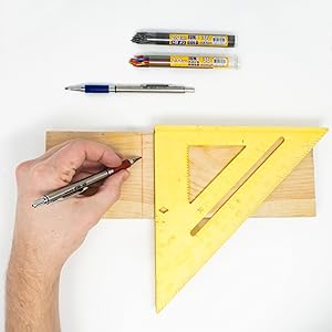 June Gold colored mechanical pencil measuring wood