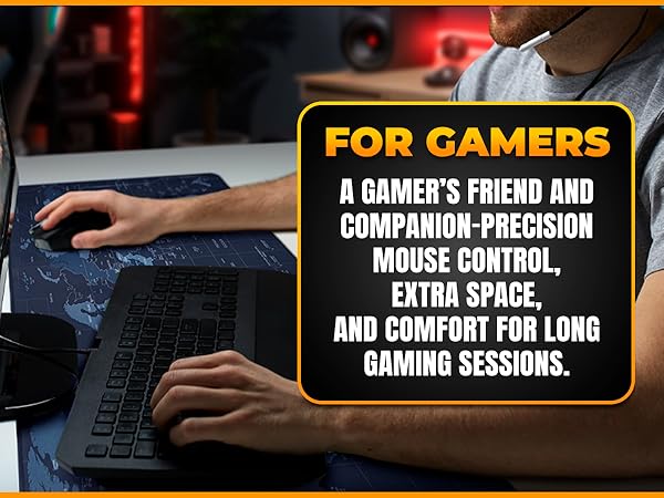 Gamer using large mouse pad with mechanical keyboard and gaming setup