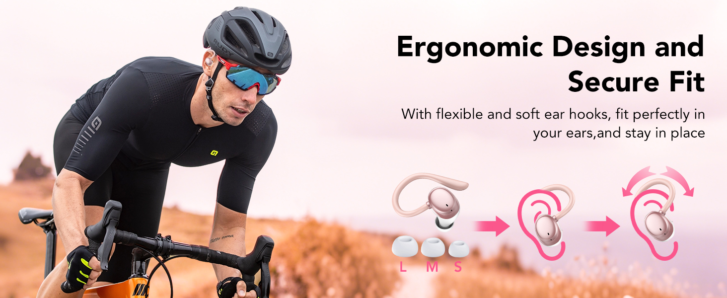 Text reads 'Ergonomic Design and Secure Fit With flexible and soft ear hooks, fit perfectly in your ears and stay in place'. Cyclist in black shirt wearing gray helmet and sunglasses with earbuds, three pink ear hook sizing options shown.